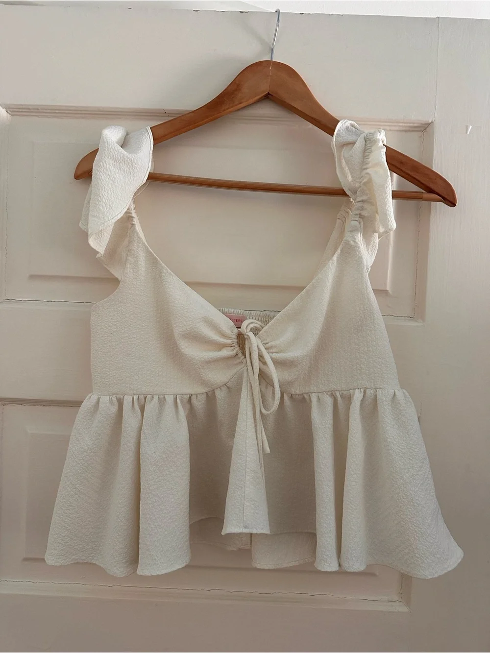 Women’s Cream Ruffle Tie-Front Peplum Tank Top - Picture 1 of 2